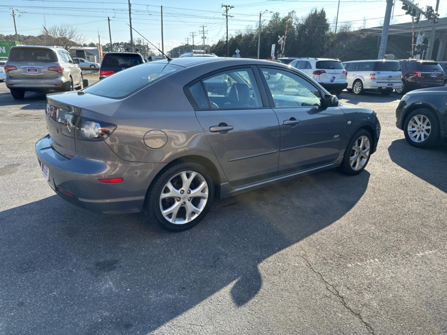 2007 Gray Mazda MAZDA3 s Grand Touring 4-Door (JM1BK323571) with an 2.3L L4 DOHC 16V engine, located at 5700 Curlew Drive, Norfolk, VA, 23502, (757) 455-6330, 36.841885, -76.209412 - Photo#2